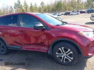 2018 Toyota RAV4 LE with VIN JTMBFREV2JD228186, listed as a IAAI auction lot 42076730 with 93,899 mi miles. Bid and sale history available at carsss.com. Image 6.