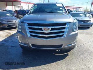 2018 Cadillac Escalade Luxury z VIN 1GYS3BKJ0JR147752, wystawiony jako IAAI lot #41419140 z przebiegiem 124 376 mil mil oraz . Historia ofert i sprzedaży dostępna na DreamBid. Obrazek 13.