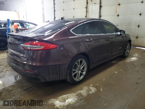 2019 Ford Fusion Hybrid Titanium with VIN 3FA6P0RU2KR211799, listed as a Copart auction lot 70843212 with 54,157 mi miles. Bid and sale history available at carsss.com. Image 3.