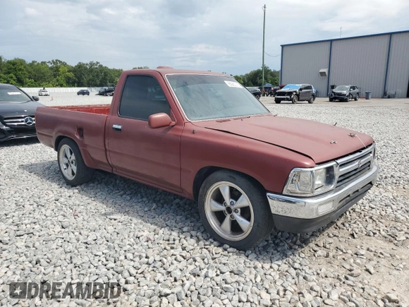 1994 Toyota Pickup DLX with VIN 4TARN81P3RZ163491, listed as a Copart auction lot 65920015 with 212,592 mi miles and Clean title. Bid and sale history available at DreamBid. Image 4.