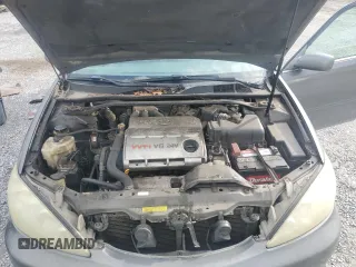 2005 Toyota Camry LE with VIN 4T1BF32K45U599214, listed as a Copart auction lot 52609295 with 304,316 mi miles and Salvage Title. Bid and sale history available at DreamBid. Image 12.