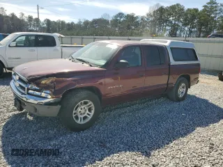 2001 Dodge Dakota Sport z VIN 1B7GL2ANX1S102505, wystawiony jako Copart lot #47586155 z przebiegiem 242 272 mil mil oraz Szkoda całkowita • Salvage title. Historia ofert i sprzedaży dostępna na DreamBid. Obrazek 1.