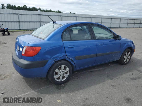 2009 Kia Rio LX with VIN KNADE223696530633, listed as a Copart auction lot 68371794 with 165,505 mi miles and Salvage Title. Bid and sale history available at DreamBid. Image 3.