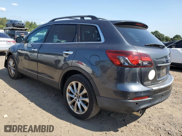 2015 Mazda CX-9 Grand Touring with VIN JM3TB3DV1F0461061, listed as a Copart auction lot 67194994 with 87,637 mi miles and Salvage Title. Bid and sale history available at carsss.com. Image 2.