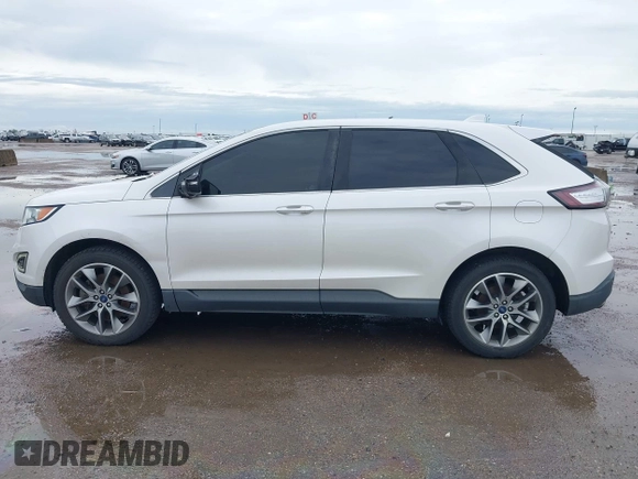 2015 Ford Edge Titanium z VIN 2FMTK3K82FBC42299, wystawiony jako IAAI lot #41912657 z przebiegiem 198 144 mil mil oraz . Historia ofert i sprzedaży dostępna na DreamBid. Obrazek 14.