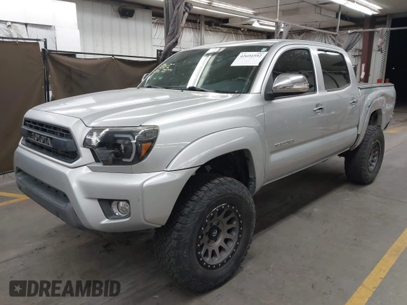 2013 Toyota Tacoma z VIN 3TMLU4EN0DM123507, wystawiony jako IAAI lot #42691592 z przebiegiem 100 894 mil mil oraz . Historia ofert i sprzedaży dostępna na DreamBid. Obrazek 2.