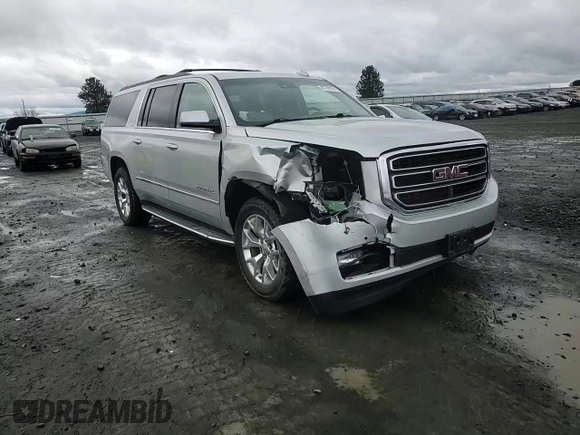 2015 GMC Yukon XL SLT with VIN 1GKS2HKC8FR616031, listed as a Copart auction lot 48740785 with 128,467 mi miles and Salvage Title. Bid and sale history available at carsss.com. Image 11.