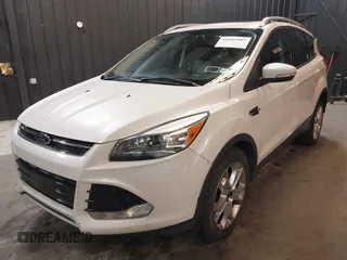 2016 Ford Escape Titanium with VIN 1FMCU9J94GUB02810, listed as a IAAI auction lot 41643907 with 119,684 mi miles. Bid and sale history available at carsss.com. Image 17.