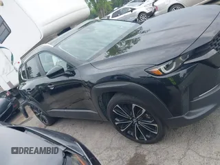 2023 Mazda CX-50 Meridian Edition with VIN 7MMVABXY1PN145913, listed as a IAAI auction lot 42632620 with 23,444 mi miles and . Bid and sale history available at DreamBid. Image 13.