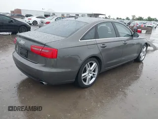 2014 Audi A6 Premium Plus z VIN WAUGFAFC3EN087176, wystawiony jako IAAI lot #42117602 z przebiegiem 53 571 mil mil oraz . Historia ofert i sprzedaży dostępna na DreamBid. Obrazek 4.
