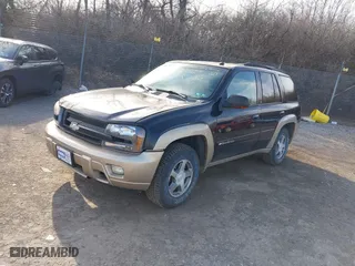 2004 Chevrolet TrailBlazer LS with VIN 1GNDT13S742304861, listed as a IAAI auction lot 41597648 with 126,526 mi miles. Bid and sale history available at carsss.com. Image 2.