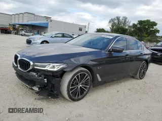 2022 BMW 5 Series 530e with VIN WBA13AG02NCK27636, listed as a Copart auction lot 80266154 with 59,265 mi miles and Salvage title. Bid and sale history available at DreamBid. Image 1.
