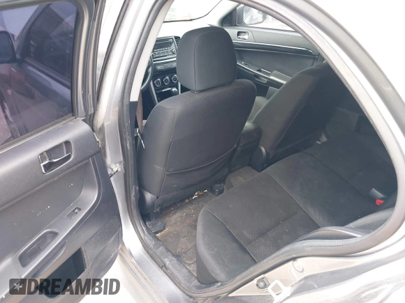 2016 Mitsubishi Lancer ES with VIN JA32U2FU4GU008977, listed as a IAAI auction lot 42139304 with 145,521 mi miles. Bid and sale history available at carsss.com. Image 12.