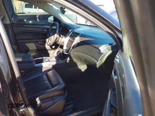 2014 Cadillac SRX with VIN 3GYFNAE32ES550136, listed as a IAAI auction lot 41219755 with 161,878 mi miles and . Bid and sale history available at DreamBid. Image 5.