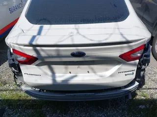 2016 Ford Fusion Titanium Hybrid with VIN 3FA6P0RU1GR259947, listed as a IAAI auction lot 41695377 with 97,605 mi miles. Bid and sale history available at carsss.com. Image 17.
