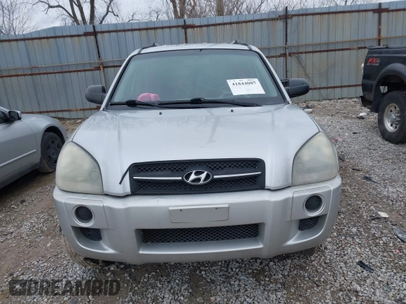 2006 Hyundai Tucson GL with VIN KM8JM12B56U480904, listed as a IAAI auction lot 41844087 with 216,322 mi miles. Bid and sale history available at carsss.com. Image 11.