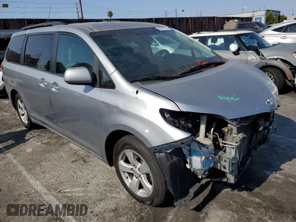 2011 Toyota Sienna LE AAS with VIN 5TDKK3DC6BS054847, listed as a Copart auction lot 64673975 with 197,266 mi miles and Salvage title. Bid and sale history available at DreamBid. Image 4.