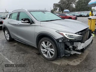 2019 Infiniti QX30 Luxe with VIN SJKCH5CP4KA011380, listed as a Copart auction lot 48665745 with 86,749 mi miles and Salvage title. Bid and sale history available at DreamBid. Image 4.