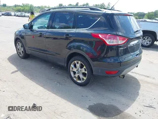 2013 Ford Escape SEL with VIN 1FMCU9HX5DUC90186, listed as a IAAI auction lot 42650691 with 151,009 mi miles and . Bid and sale history available at DreamBid. Image 3.