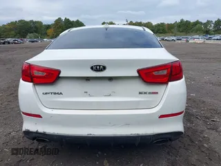 2014 Kia Optima SXL Turbo with VIN 5XXGR4A65EG263055, listed as a IAAI auction lot 40468453 with 93,494 mi miles and . Bid and sale history available at DreamBid. Image 16.