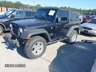 2012 Jeep Wrangler Sport with VIN 1C4AJWAG0CL247103, listed as a IAAI auction lot 42181637 with 159,003 mi miles and . Bid and sale history available at DreamBid. Image 2.