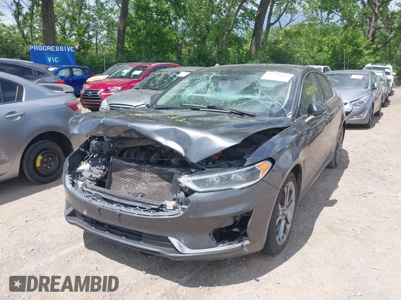 2020 Ford Fusion Titanium with VIN 3FA6P0RUXLR182120, listed as a IAAI auction lot 42351542 with 141,746 mi miles and . Bid and sale history available at DreamBid. Image 17.