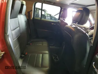 2016 Jeep Patriot High Altitude with VIN 1C4NJRFBXGD597578, listed as a Copart auction lot 58857115 with 128,911 mi miles and Salvage title. Bid and sale history available at DreamBid. Image 11.