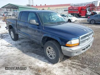 2004 Dodge Dakota SLT with VIN 1D7HG48N24S680151, listed as a IAAI auction lot 41620040 with 96,447 mi miles. Bid and sale history available at carsss.com. Image 1.