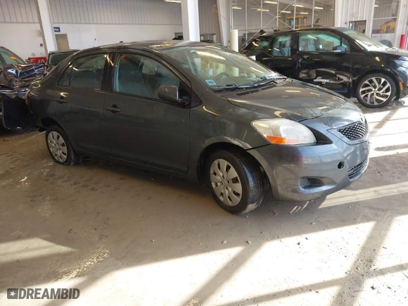 2010 Toyota Yaris with VIN JTDBT4K38A1355010, listed as a IAAI auction lot 41563391 with 154,835 mi miles. Bid and sale history available at carsss.com. Image 1.