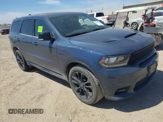 2020 Dodge Durango R/T with VIN 1C4SDHCT3LC166386, listed as a IAAI auction lot 41816139 with 104,637 mi miles and . Bid and sale history available at DreamBid. Image 1.
