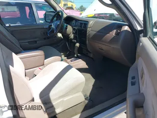 2001 Toyota Tacoma PreRunner z VIN 5TEGN92N91Z852586, wystawiony jako IAAI lot #42299321 z przebiegiem 233 111 mil mil oraz . Historia ofert i sprzedaży dostępna na DreamBid. Obrazek 5.