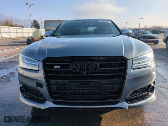 2015 Audi S8 с VIN WAUK2AFDXFN017156, выставлен на аукционе Copart как лот 50602605 с пробегом 100 224 миль миль и Списание • Salvage title. История ставок и продаж доступна на DreamBid. Изображение 5.