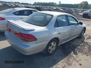 2001 Honda Accord EX z VIN 1HGCG16571A002293, wystawiony jako IAAI lot #42081307 z przebiegiem 336 808 mil mil oraz . Historia ofert i sprzedaży dostępna na DreamBid. Obrazek 4.