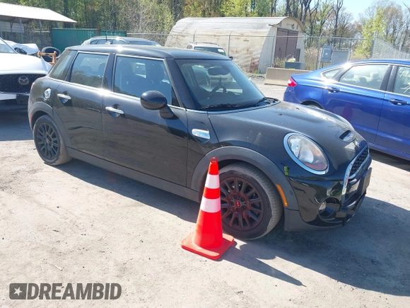 2016 MINI Hardtop 4 Door S z VIN WMWXU3C51G2D29400, wystawiony jako IAAI lot #42064309 z przebiegiem 85 021 mil mil oraz . Historia ofert i sprzedaży dostępna na DreamBid. Obrazek 1.