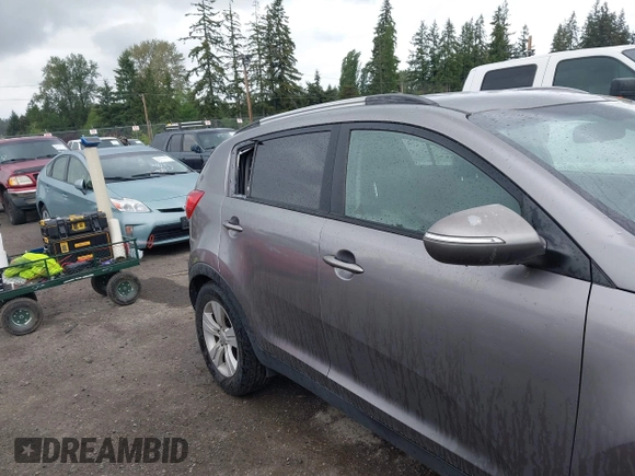 2012 Kia Sportage LX with VIN KNDPB3A22C7262656, listed as a IAAI auction lot 42301331 with 180,743 mi miles and . Bid and sale history available at DreamBid. Image 12.