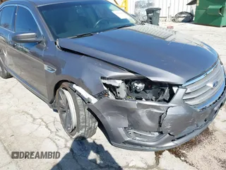 2013 Ford Taurus SEL z VIN 1FAHP2H83DG231000, wystawiony jako IAAI lot #41986420 z przebiegiem 200 390 mil mil oraz . Historia ofert i sprzedaży dostępna na DreamBid. Obrazek 6.