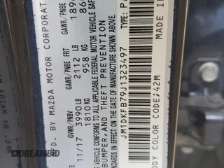 2018 Mazda CX-3 Sport z VIN JM1DKFB79J1323497, wystawiony jako Copart lot #56168875 z przebiegiem 60 284 mil mil oraz Szkoda całkowita • Salvage title. Historia ofert i sprzedaży dostępna na DreamBid. Obrazek 13.