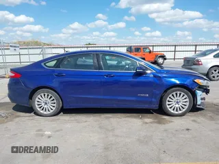 2014 Ford Fusion SE Hybrid с VIN 3FA6P0LU9ER129016, выставлен на аукционе IAAI как лот 42269103 с пробегом 170 001 миль миль и . История ставок и продаж доступна на DreamBid. Изображение 13.