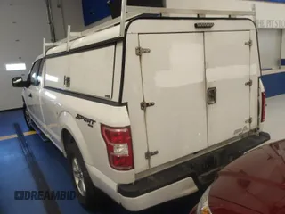2019 Ford F-150 XL with VIN 1FTFX1E42KKD61762, listed as a IAAI auction lot 41979420 with 117,597 mi miles. Bid and sale history available at carsss.com. Image 1.
