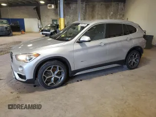 2017 BMW X1 xDrive28i with VIN WBXHT3C36H5F69280, listed as a Copart auction lot 52541235 with 69,051 mi miles and Salvage Title. Bid and sale history available at carsss.com. Image 1.