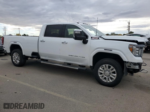 2021 GMC Sierra 3500HD Denali z VIN 1GT49WEY2MF126307, wystawiony jako Copart lot #77030854 z przebiegiem 49 598 mil mil oraz Szkoda całkowita • Salvage title. Historia ofert i sprzedaży dostępna na DreamBid. Obrazek 4.