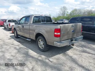 2004 Ford F-150 XL with VIN 1FTPX12584NA58780, listed as a IAAI auction lot 42123687 with 160,672 mi miles. Bid and sale history available at carsss.com. Image 3.