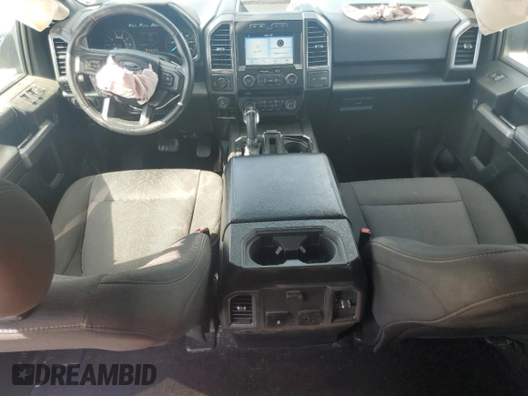 2018 Ford F-150 XL with VIN 1FTEW1EG7JFA64678, listed as a Copart auction lot 56411315 with 148,775 mi miles and Salvage title. Bid and sale history available at DreamBid. Image 8.
