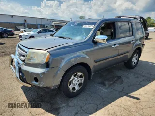 2009 Honda Pilot LX with VIN 5FNYF48219B026989, listed as a Copart auction lot 65070495 with 163,740 mi miles and Salvage title. Bid and sale history available at DreamBid. Image 1.