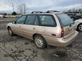 1997 Ford Escort LX with VIN 3FALP15P7VR132710, listed as a Copart auction lot 87546515 with 185,646 mi miles and Salvage Title. Bid and sale history available at carsss.com. Image 2.