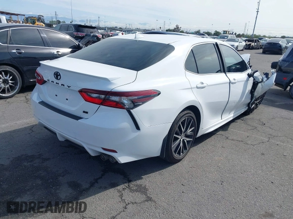 2022 Toyota Camry SE with VIN 4T1G11AKXNU070473, listed as a IAAI auction lot 41937541 with 57,598 mi miles and . Bid and sale history available at DreamBid. Image 4.