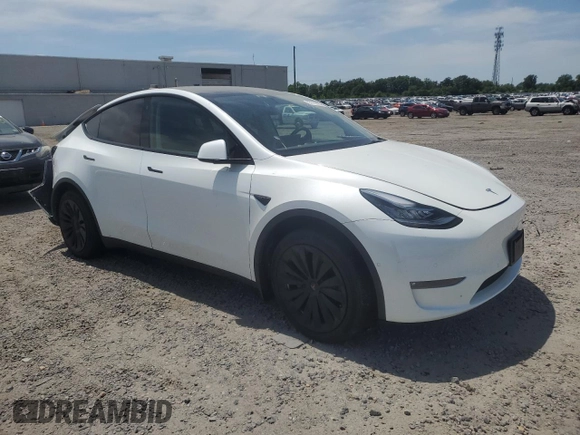 2022 Tesla Model Y Long Range z VIN 7SAYGDEE9NF455614, wystawiony jako Copart lot #57612985 z przebiegiem 22 101 mil mil oraz Szkoda całkowita • Salvage title. Historia ofert i sprzedaży dostępna na DreamBid. Obrazek 4.