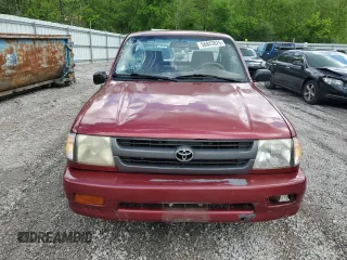 1999 Toyota Tacoma z VIN 4TANL42N4XZ435246, wystawiony jako Copart lot #56843025 z przebiegiem 197 295 mil mil oraz Szkoda całkowita • Salvage title. Historia ofert i sprzedaży dostępna na DreamBid. Obrazek 5.