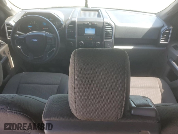 2018 Ford F-150 XL с VIN 1FTEW1EG6JKF05708, выставлен на аукционе Copart как лот 62359605 с пробегом 106 128 миль миль и Списание • Salvage title. История ставок и продаж доступна на DreamBid. Изображение 8.
