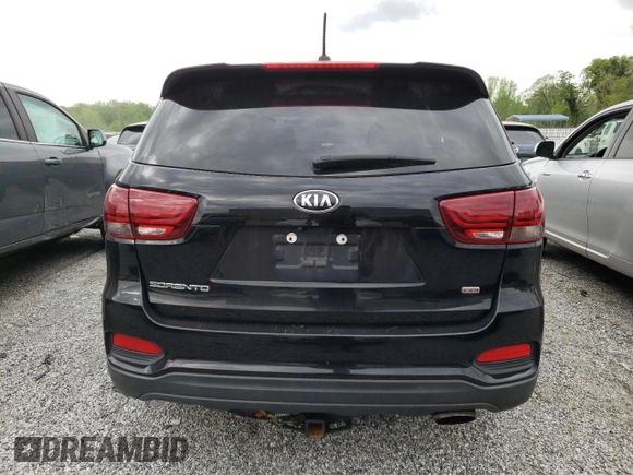 2019 Kia Sorento L z VIN 5XYPG4A34KG500069, wystawiony jako Copart lot #52714105 z przebiegiem 237 472 mil mil oraz Szkoda całkowita • Salvage title. Historia ofert i sprzedaży dostępna na DreamBid. Obrazek 6.